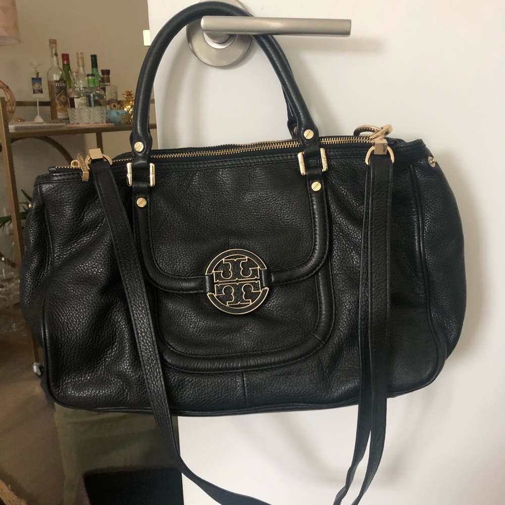 Tory Burch handbag with gold detail.